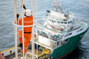 (c)TotalEnergies Offshore Operator climbing