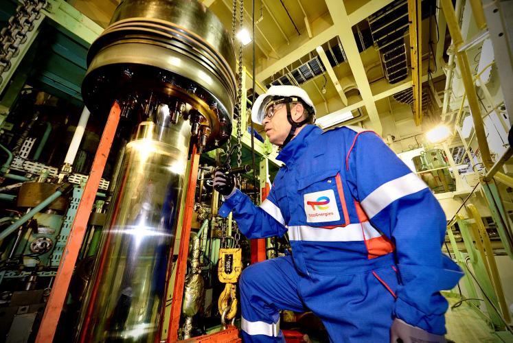 A Lubmarine Engineer during an engine inspection onboard a ship