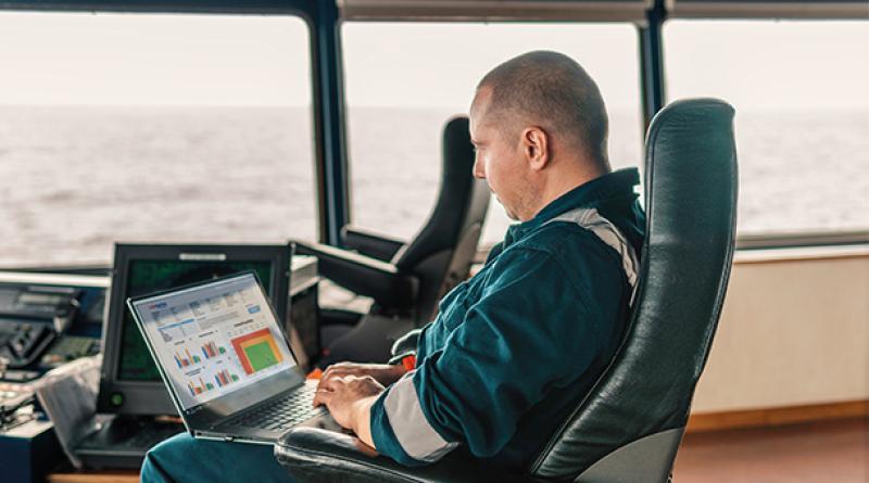 Chief Engineer consulting LubPortal on a laptop