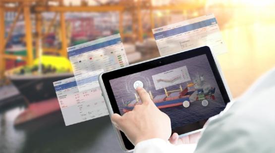 ©TotalEnergies Shipping operator consulting Lubmarine digital portal on a tablet