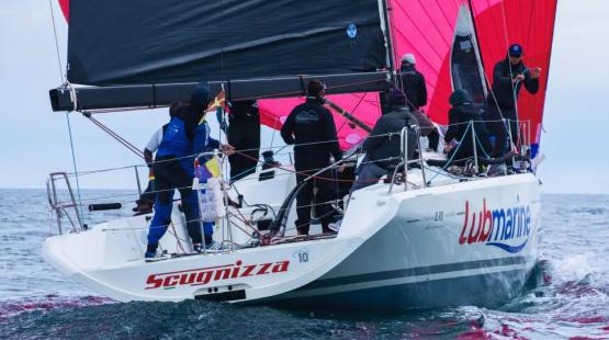 ©TotalEnergies, Scugnizza Scugnizza Racing Boat with Lubmarine Logo